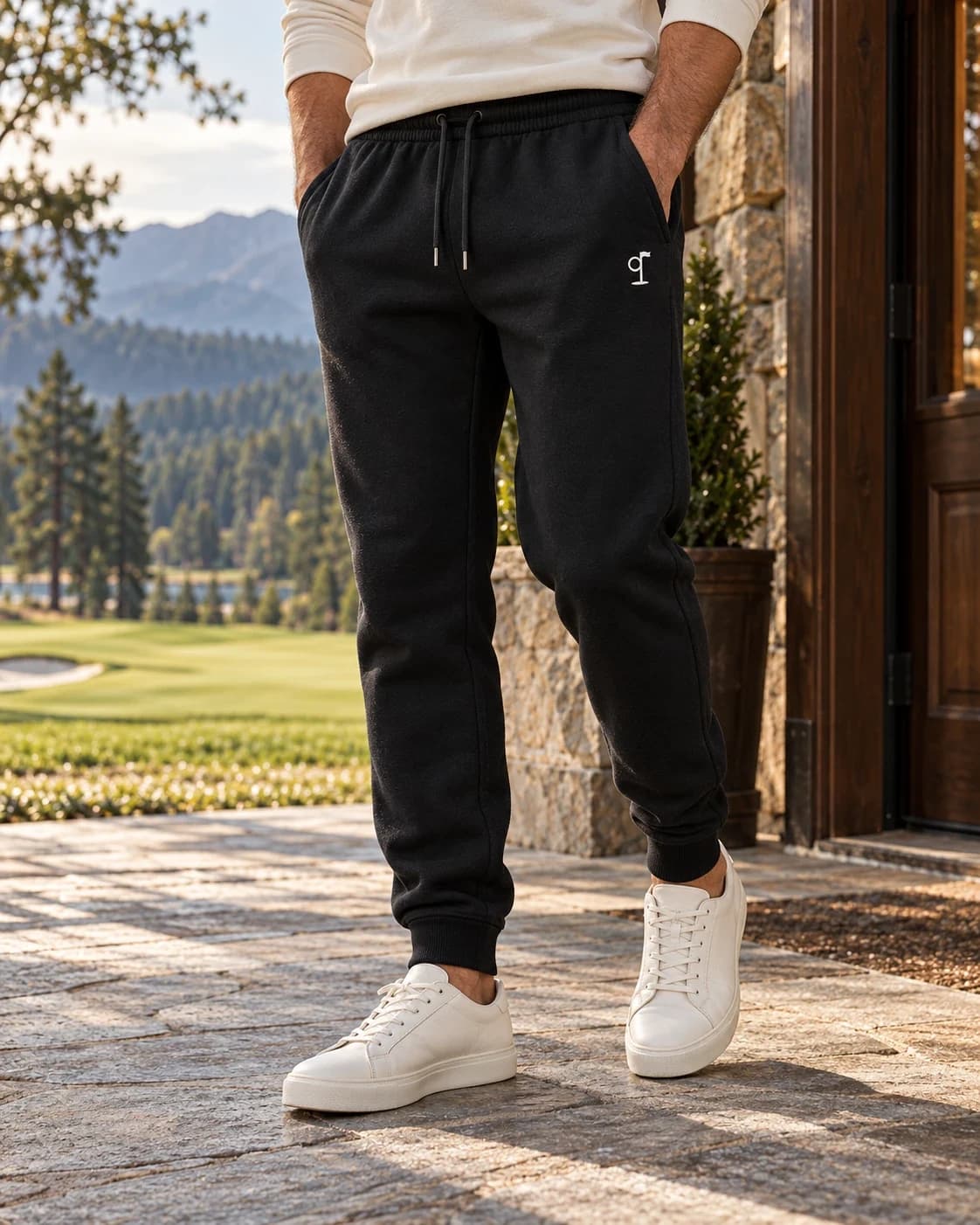 The 19th Hole Jogger in black worn with white sneakers