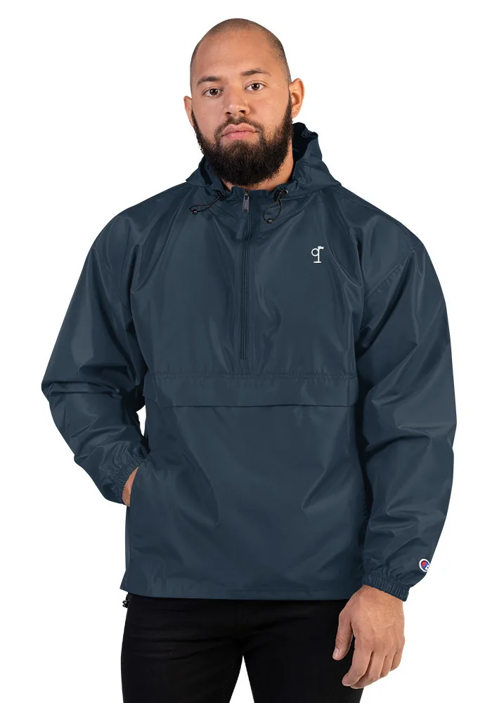 The Turn Anorak in navy, a packable half-zip pullover
